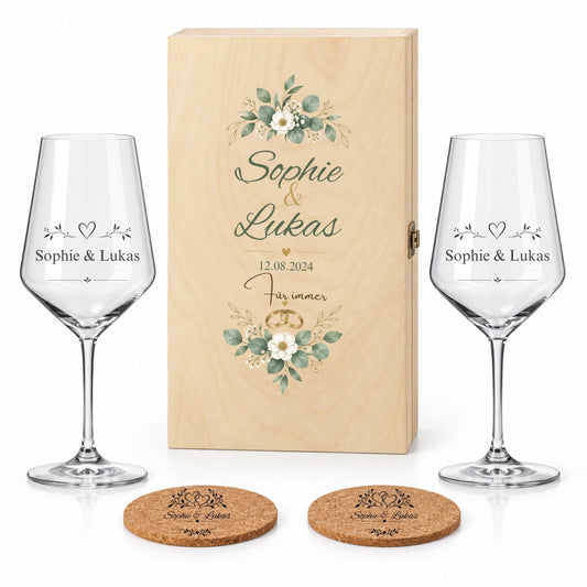 Personalisiertes Jahrestagsgeschenk mit zwei Weingläsern, zwei Korkuntersetzern und Holzbox im Motiv Blüten und Ringe.